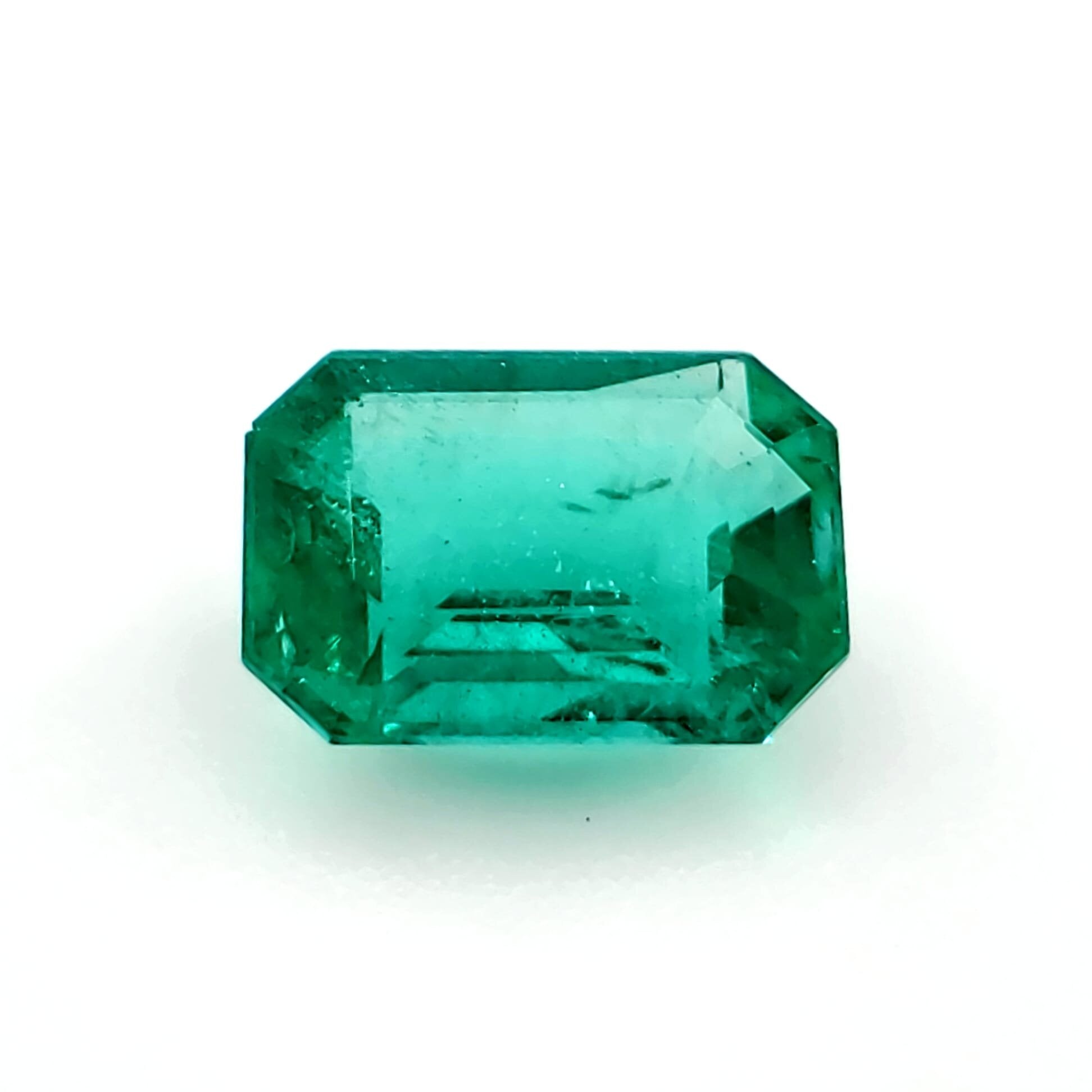0.84 Carat Emerald Cut Forest Blue Emerald (Non-Certified) IGr SI3