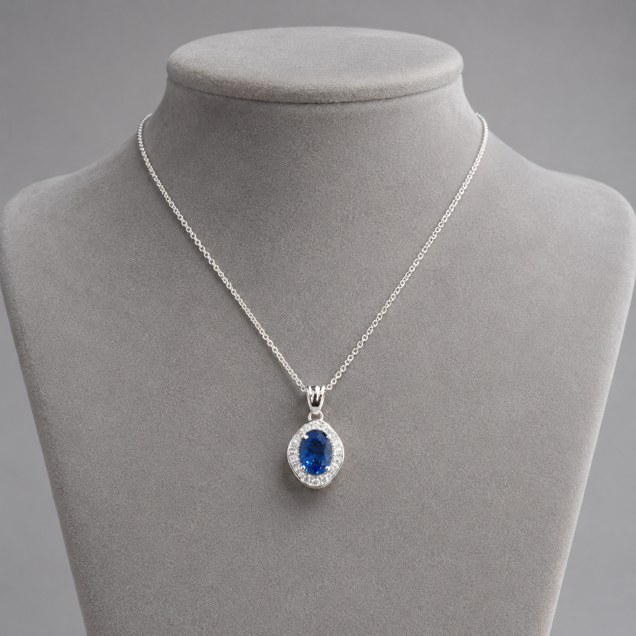 Natural Blue Cylon Sapphire and Diamond Halo Pendant Platinum