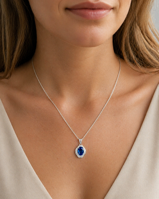 Natural Blue Cylon Sapphire and Diamond Halo Pendant Platinum