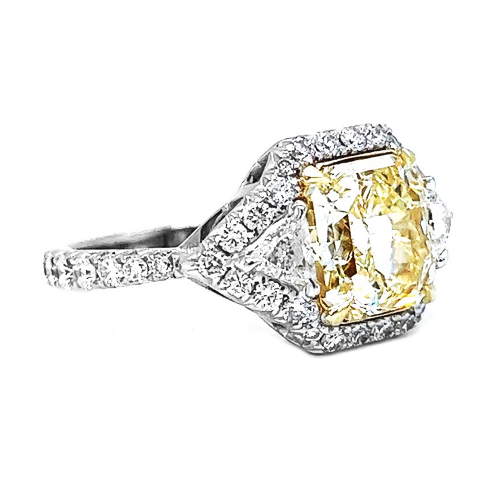 Natural Radiant Cut Fancy Yellow Diamond with Triangle Cut Diamond Halo Ring, in White Gold