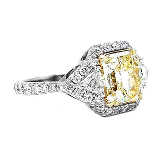 Natural Mined Radiant Cut Fancy Yellow Diamond with Triangle Cut Diamond Halo Ring White Gold