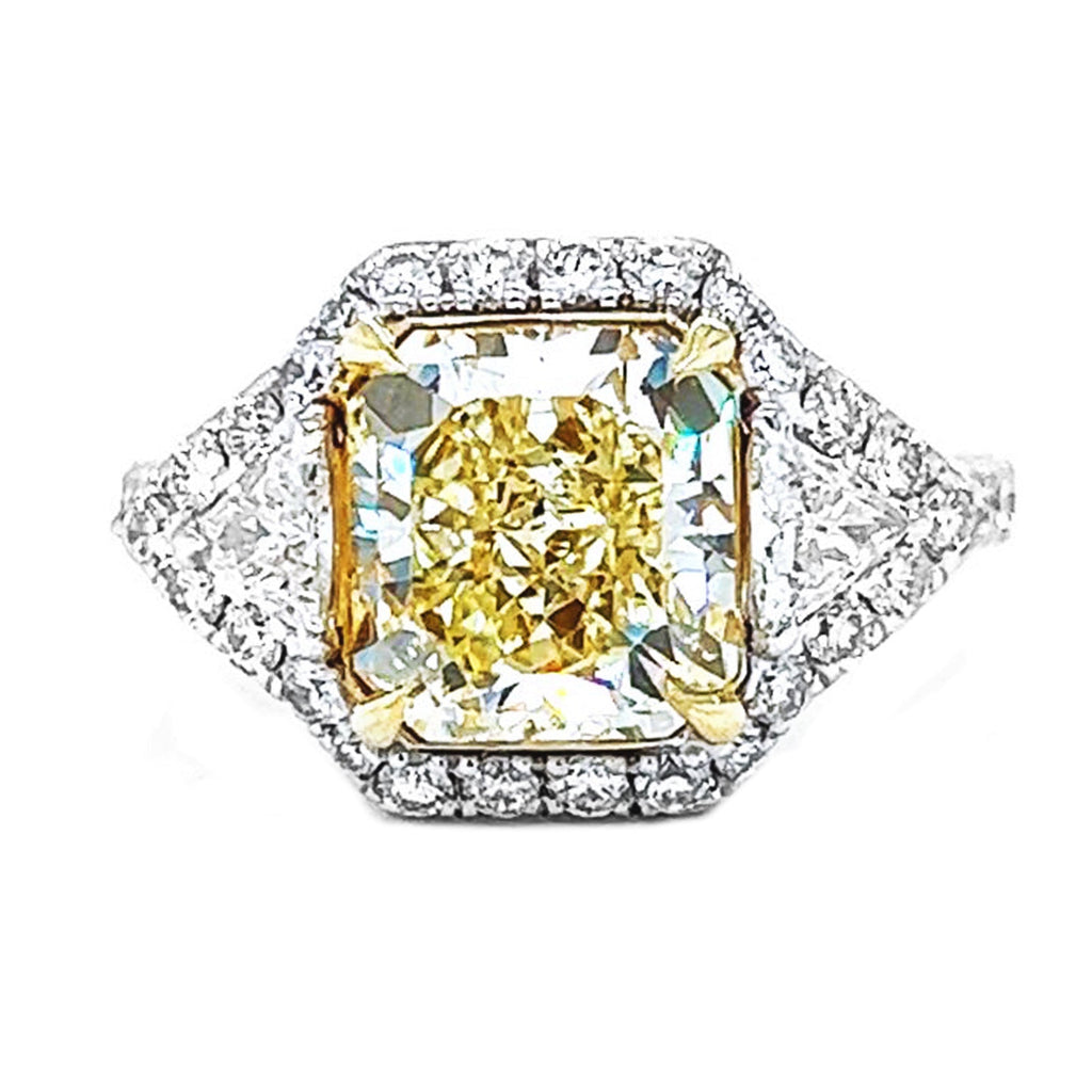 Natural Radiant Cut Fancy Yellow Diamond with Triangle Cut Diamond Halo Ring, in White Gold