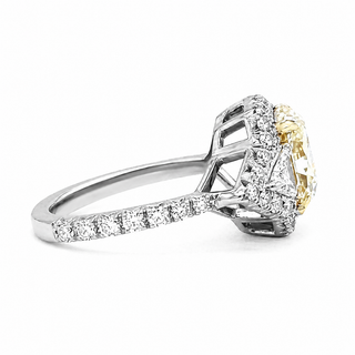Natural Radiant Cut Fancy Yellow Diamond with Triangle Cut Diamond Halo Ring 18KT White Gold