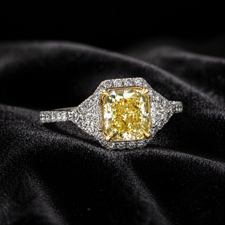 Natural Radiant Cut Fancy Yellow Diamond with Triangle Cut Diamond Halo Ring 18KT White Gold