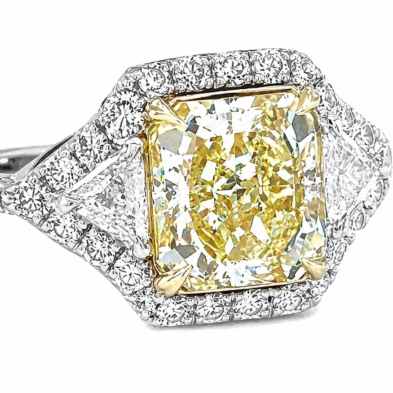 Natural Radiant Cut Fancy Yellow Diamond with Triangle Cut Diamond Halo Ring 18KT White Gold
