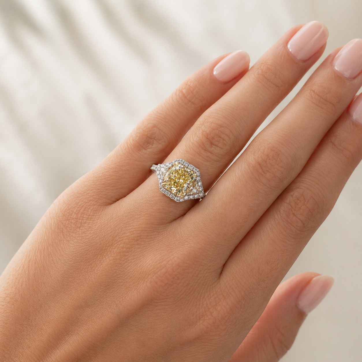 Natural Radiant Cut Fancy Yellow Diamond with Triangle Cut Diamond Halo Ring 18KT White Gold