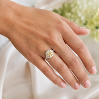 Natural Radiant Cut Fancy Yellow Diamond with Triangle Cut Diamond Halo Ring 18KT White Gold