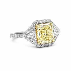 Natural Radiant Cut Fancy Yellow Diamond with Triangle Cut Diamond Halo Ring 18KT White Gold