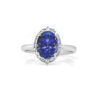 Natural Oval Tanzanite and Round Diamond Halo Floral White Gold Ring