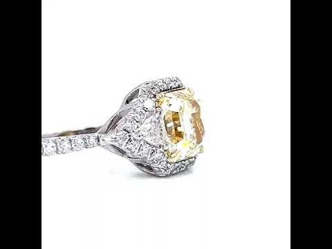 Natural Radiant Cut Fancy Yellow Diamond with Triangle Cut Diamond Halo Ring, in White Gold