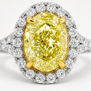 Natural Oval Fancy Light Yellow Diamond Halo Ring 18KT Yellow Gold